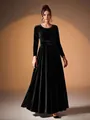 Elegant black velvet long-sleeved evening gown with pleated A-line skirt and waist belt. - S / Dresses / Black