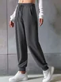 Detailed view of women's dark gray drawstring sweatpants with elastic waist and cuffs - 3XL / Bottoms / Iron Grey