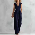 Elegante tuta smanicata blu navy con scollo a V, gamba larga e cintura coordinata in vita - Taglia S / Tute intere / Blu navy