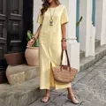 Detalle de vestido largo amarillo de lino con bolsillos delanteros y abertura lateral. - 3XL / Albaricoque Claro