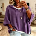 Detailed view of loose purple knitted hoodie for women with elegant drawstring accents - S / Tops / Purple