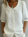 Blouse blanche rétro à manches mi-longues avec broderie florale chic - Blanc