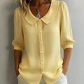 Elegante gelbe Leinenbluse mit kurzen Puffärmeln und Peter-Pan-Kragen für Damen - S / Oberteile / Hellgelb