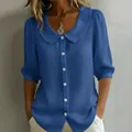 Elegante blaue Kurzarmbluse mit Peter-Pan-Kragen und weißen Knöpfen für den Sommer - Saphirblau