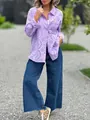 Detailed view of women's purple eyelet embroidered shirt with stylish hollow-out patterns - Purple