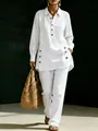 Full view of a women's white long-sleeve linen shirt and matching casual trousers. - S / Top And Bottom / White