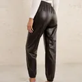 Stylish women's black PU leather joggers with elastic high waist and cuffed ankles - S / Bottoms / Coffee