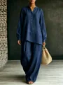 Detailed view of elegant women's navy blue long-sleeve tunic and wide-leg trousers set - S / Top And Bottom / Dark Blue