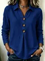 Detailed view of royal blue shirt collar with three large brown wooden-style buttons - S / Tops / Dark Blue
