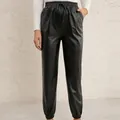 Stylish women's black PU leather joggers with drawstring waist and elastic cuffs - S / Bottoms / Black