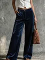 Close-up of navy blue velvet high-waisted trousers with wide-leg cut and pockets - S / Bottoms / Dark Blue
