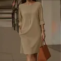 Robe élégante kaki à col rond avec manches mi-longues et poches - S / Robes / Kaki