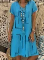 Detail view of women's bohemian blue V-neck dress with black geometric line print - S / Dresses / Blue