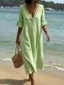 Elegante vestido largo verde claro con cuello en V y encaje para vacaciones de playa - S / Vestidos / Verde claro