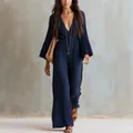 Full length detail of bohemian navy blue V-neck long sleeve jumpsuit on fashion model - XS / Jumpsuits / Navy Blue