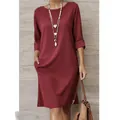 Robe élégante bordeaux à col rond avec manches mi-longues et poches latérales pratiques - Bordeaux