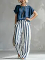Detalle del conjunto de top azul texturizado y pantalones anchos a rayas para mujer - 3XL / Top Y Pantalón / Azul marino