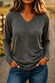 Close-up of a women's casual V-neck long sleeve t-shirt in soft heathered charcoal gray. - Dark Gray