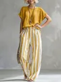 Elegante conjunto de dos piezas para mujer con top amarillo y pantalón ancho a rayas - Naranja