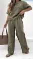 Detailed view of women's olive green linen casual two-piece set with flower embroidery - S / Top And Bottom / Army Green
