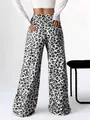 Close-up back view showing the leopard print pattern on these stylish wide-leg trousers - S / Bottoms / No Drawstring / White