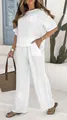 Full detail of white 2-piece linen set featuring elegant floral embroidery and wide leg pants - S / Top And Bottom / White