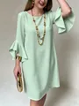 Elegante vestido verde menta con mangas de campana y volantes para un look sofisticado - Esmeralda