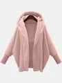 Close-up of a women's oversized fuzzy teddy fleece hooded jacket in dusty pink - 3XL / Tops / Pink