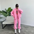 Vibrant pink oversized zip-up hoodie and matching sweatpants two-piece tracksuit set - Pink