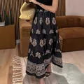 Elegant Bohemian high-waisted black floral print A-line maxi skirt for summer beach wear. - S / Bottoms / Rainbow
