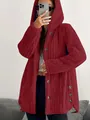 Detailed view of a wine red hooded fuzzy sherpa coat with buttons and side slits. - 3XL / Tops / Red