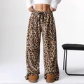 Women's trendy leopard print wide-leg pants with cozy flannel texture for casual wear - S / Bottoms / Ocher Brown