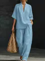 Completo estivo da donna azzurro: top a maniche corte con scollo a V e pantaloni larghi chic - Taglia S / Top E Pantaloni / Blu