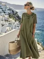 Détail d'une robe verte olive à manches courtes avec nœud et poches style vacances - S / Robes / Vert Militaire