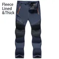 Pantaloni da trekking softshell impermeabili foderati in pile blu scuro da uomo - Taglia L / Parte Inferiore (Foderata in Pile & Ispessita) / Blu