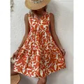 Robe bohème sans manches à col en V avec un imprimé de feuilles orange et blanc - S / Robes / Orange