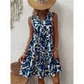 Robe bohème sans manches à col en V et imprimé floral de feuilles bleu marine chic - S / Robes / Bleu marine