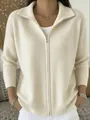 Detail view of a cream zip-up knit cardigan with a ribbed lapel collar and casual style - Apricot