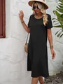 Vue détaillée d'une robe midi noire en coton et lin à coupe ample et col rond - S / Robes / Noir