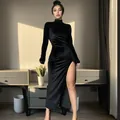 Elegant black high neck velvet maxi dress featuring ruched waist and sexy high slit detail. - S / Dresses / Black