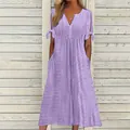 Détail de robe d'été violette à col en V avec broderie anglaise et manches nouées - Violet
