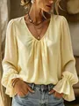 Detailed view of elegant light yellow V-neck pleated long sleeve blouse - S / Tops / Light Yellow