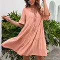 Bohemian coral pink loose V-neck mini dress with tassels and tiered skirt details - S / Dresses / Pink
