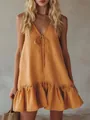 Detailed view of women's mustard yellow V-neck ruffle sleeveless summer vacation dress - S / Dresses / Turmeric