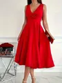 Detailed view of an elegant red sleeveless dress featuring a cross-front V-neckline - S / Red