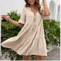 Boho chic loose beige V-neck striped dress with tassel detail and ruffle sleeves - S / Dresses / Apricot