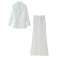 Detail view of a white double-breasted blazer paired with a delicate floral lace maxi skirt - S / Top And Bottom / White Zirconia Set