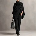 Elegant black winter two-piece set featuring turtleneck poncho and wide-leg knit trousers - S / Top And Bottom / Black