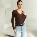 Detailed view of women's brown V-neck top with elegant lace trim on neckline and cuffs - XS / Top (L-1358) / Brown