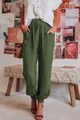Detail van olijfgroene casual joggers met trekkoord en grote zakken voor damesmode. - Legergroen